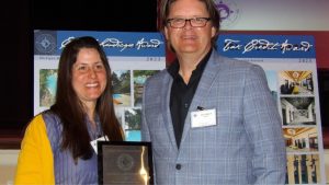 Rebecca Torsell, Ford House Director of Preservation, and Stephen White, Principal with Albert Kahn Associates accept the 2023 Cultural Landscape Award for Ford House