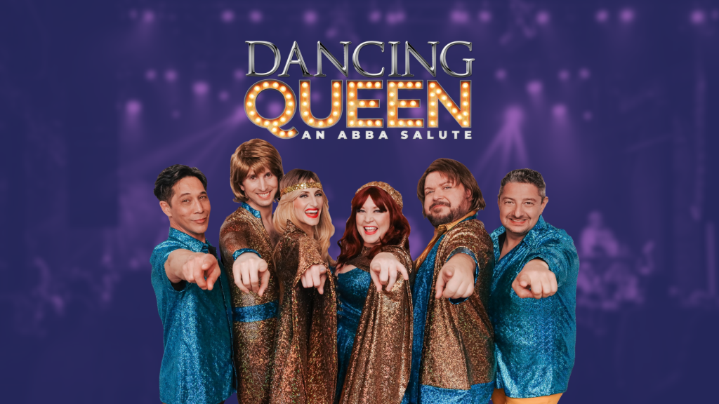 Group photo of the tribute band Dancing Queen: An ABBA Salute, featuring six performers in glittering blue and gold disco costumes, pointing toward the camera against a purple stage backdrop.